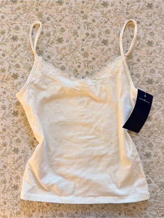 Brandy Melville Tops - Brandy Melville white lace cami top with button details